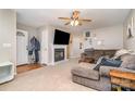 Living room featuring a fireplace and plenty of natural light at 844 Turning Point Ln, Concord, NC 28027