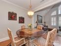 Charming dining area with round table and view into Gathering room at 11756 Easthampton Cir, Charlotte, NC 28277