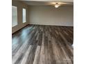 Spacious living room featuring wood-look floors and neutral walls at 155 Trail Wood Ct, Salisbury, NC 28146