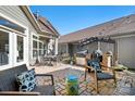Brick patio with outdoor seating, grill, and pergola at 19411 Greentree Way, Cornelius, NC 28031