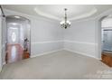 Bright dining room with hardwood floors and chandelier at 5726 Cactus Valley Rd # 238, Charlotte, NC 28277