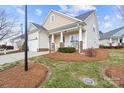 A charming single-Gathering home with a well-maintained lawn and a welcoming front porch at 1005 Jody Dr, Matthews, NC 28104