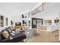 Bright living area with vaulted ceilings and a modern open floorplan at 126 Abbey Ln, Mount Gilead, NC 27306