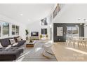 Bright, open living area features vaulted ceilings and many windows at 126 Abbey Ln, Mount Gilead, NC 27306