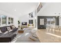 Bright living room featuring hardwood floors and large windows at 126 Abbey Ln, Mount Gilead, NC 27306