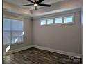 Bright bedroom with hardwood floors and multiple windows at 1846 Yardley St, Rock Hill, SC 29732