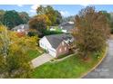 Aerial view showing home, driveway, and neighborhood at 214 Heather Glen Ln, Belmont, NC 28012