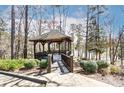 Wooden gazebo with deck overlooking a lake at 217 Ridge Reserve Dr, Lake Wylie, SC 29710