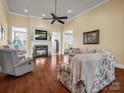 Living room features hardwood floors, fireplace, and ceiling fan at 133 Spring Forest Dr # 651, Shelby, NC 28152