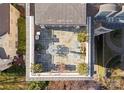 Private rooftop patio with slate tile and outdoor furniture at 186 Cherokee Rd, Charlotte, NC 28207