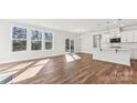 Spacious living area featuring large windows, hardwood floors, and an open floor plan at 355 Miramar Dr, York, SC 29745