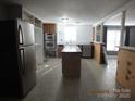 Modern kitchen with stainless steel appliances and island at 401 Gillscreek Dr, Lancaster, SC 29720