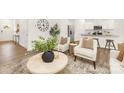 Bright living room with modern decor, stylish furnishings, and lots of natural light at 5219 Reedy Ridge Rd, Charlotte, NC 28215