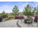 Scenic back patio with ample seating, lush landscaping, and panoramic neighborhood views at 6289 Raven Rock Dr, Denver, NC 28037