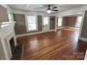 Living room with hardwood floors and fireplace at 913 9Th Ne Ave, Hickory, NC 28601