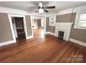 Spacious living room with hardwood floors and a fireplace at 913 9Th Ne Ave, Hickory, NC 28601