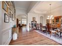 Formal dining room with hardwood floors and antique furniture at 1380 Secret Path Dr, Fort Mill, SC 29708