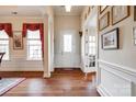 Bright entryway with hardwood floors and white trim at 1380 Secret Path Dr, Fort Mill, SC 29708