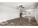 Bright and spacious living room with hardwood floors and a ceiling fan at 1506 Collinston Dr, Gastonia, NC 28052