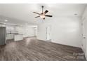 Open living space with hardwood floors and a ceiling fan at 1508 Collinston Dr, Gastonia, NC 28052