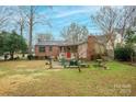 Fenced backyard with patio and seating area at 535 Tyson St, Charlotte, NC 28209