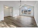 Spacious living room with large windows and hardwood floors at 1002 Joanne Ct, Kings Mountain, NC 28086