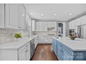 Spacious kitchen with white cabinets and island at 15903 Glen Miro Dr, Huntersville, NC 28078