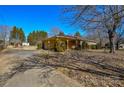 House exterior showcasing a carport and driveway at 194 Bynum Rd, Lincolnton, NC 28092