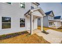 Covered front porch with gray columns and walkway at 205 Benfield Rd, Kings Mountain, NC 28086