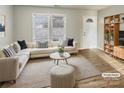 Virtually staged living room featuring a sectional sofa and built-in shelving at 3164 River Rd, Lincolnton, NC 28092