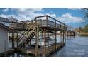 Private boat dock with lift and covered seating area at 3910 6Th Nw St, Hickory, NC 28601