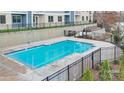 Resort-style pool with a black fence at 4455 Reed Creek Dr # 304, Sherrills Ford, NC 28673