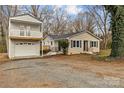 House exterior with detached garage and spacious yard at 4618 New Town Rd, Waxhaw, NC 28173