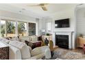 Spacious Gathering room with a fireplace, built-in cabinets, and large windows at 504 Meadow Ridge Dr, Belmont, NC 28012