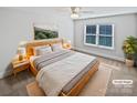 Bright bedroom with a large bed and window coverings at 6000 Bickett Ridge Dr, Monroe, NC 28110