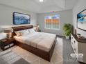 Spacious bedroom with large bed, nightstands, and stylish decor at 811 Reigate Rd, Charlotte, NC 28262