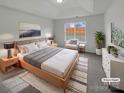 Virtually staged main bedroom with wood bed frame, gray bedding, and ample natural light at 811 Reigate Rd, Charlotte, NC 28262