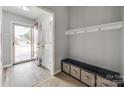 Bright entryway with storage bench and coat rack at 100 Sea Island Blvd, Fort Mill, SC 29708