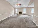 Spacious living room with fireplace and vaulted ceiling at 1107 Phifer Rd, Kings Mountain, NC 28086