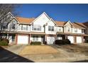 Neat row of townhouses with brick and vinyl siding at 11646 Rabbit Ridge Rd, Charlotte, NC 28270