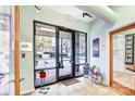 Bright and airy entryway with large windows and unique decor at 119 S Lee St, Salisbury, NC 28144