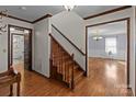 Hardwood floors and a staircase in the entryway at 1212 Ridge St, Albemarle, NC 28001