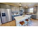 Modern kitchen with gray cabinets and quartz countertops at 12131 Plummer Ct # 1, Midland, NC 28107