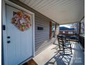 Inviting front porch with rocking chairs, ready for relaxation at 17 Walnut St, China Grove, NC 28023