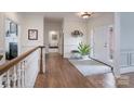 Inviting foyer with hardwood floors, neutral walls, and ample natural light from the front door at 1915 Cavendale Dr, Rock Hill, SC 29732