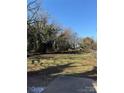 Vacant lot with grass and mature trees at 2505 Druid Hills Way, Charlotte, NC 28206