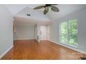 Spacious living room featuring hardwood floors and lots of natural light at 2514 Cranbrook Ln # 5, Charlotte, NC 28207