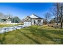 House exterior with a long driveway and neighboring houses at 335 Pinewood Ln, Rock Hill, SC 29730