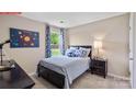 bedroom with a space theme, featuring a bed, desk and telescope at 549 Zermatt Ct, Monroe, NC 28112