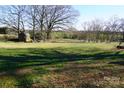 Large backyard with shed and rural views at 6302 Pleasant Hill Church Rd, Marshville, NC 28103